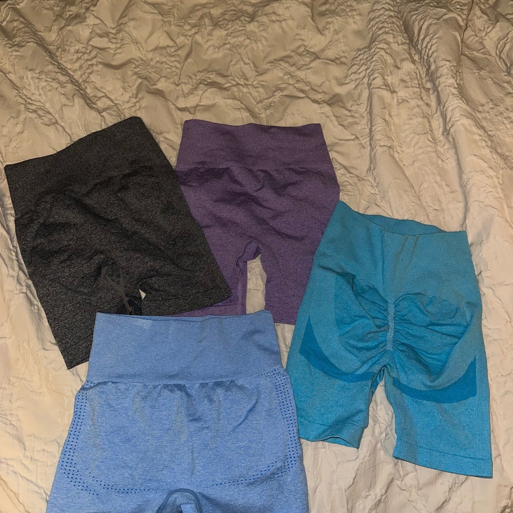 NWOT scrunch butt Set of Four High-Waisted Shorts in Black, Purple, and Blue